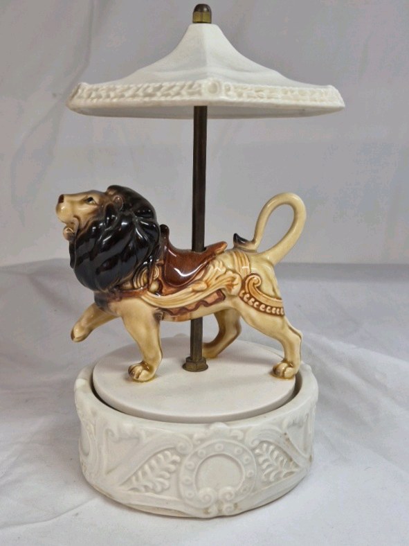 lot 93 image: Vintage Quon-Quon Music Box Dancer  Lion Carousel Figurine