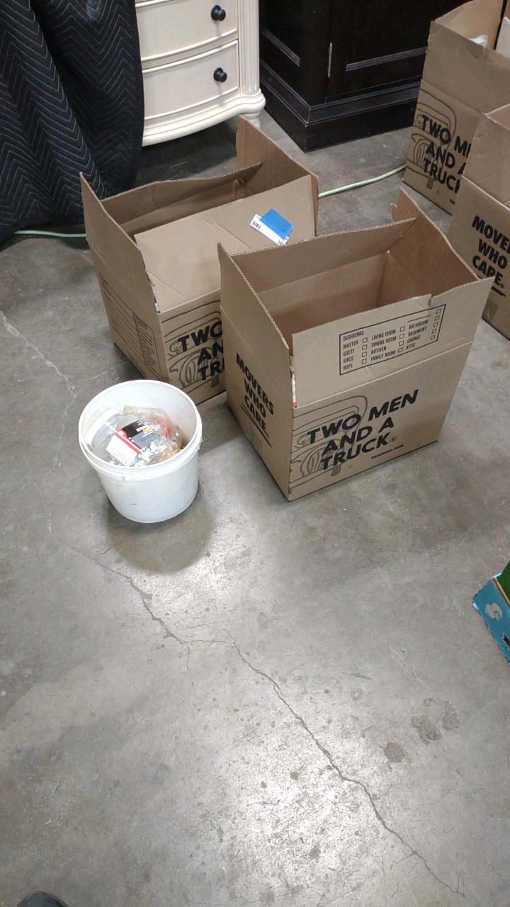 lot 143 image: pipe hangers and wire clips.