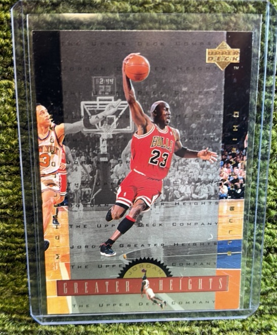lot 115 image: 1996-97 Michael Jordan Upper Deck Greater Heights Insert GH5