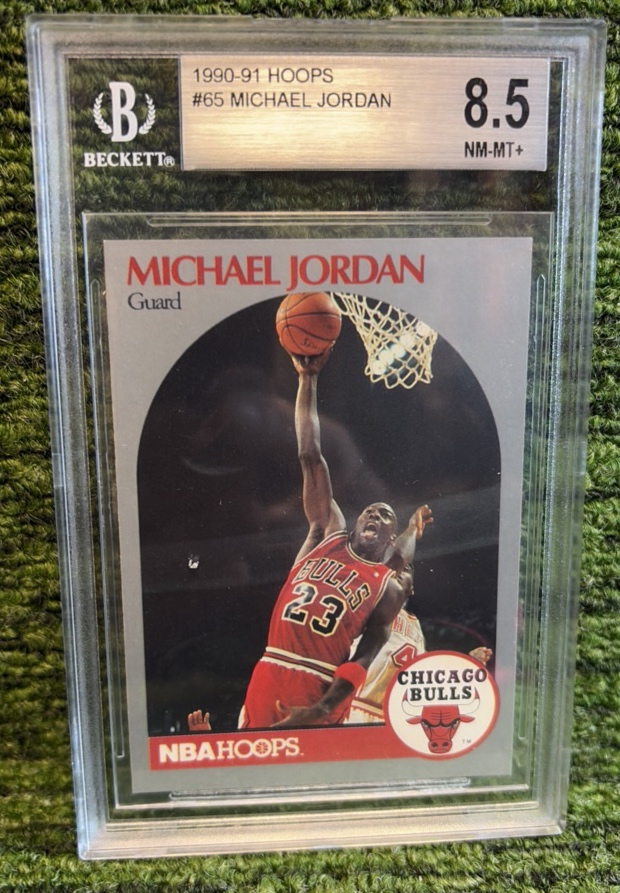 lot 121 image: 1990 HOOPS #65 MICHAEL JORDAN BGS 8.5 MINT CHICAGO BULLS