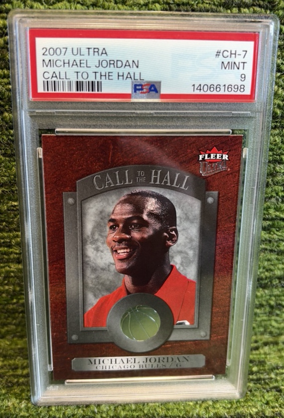 lot 13 image: 2007 Ultra # CH7 Michael Jordan Called to the Hall PSA graded MINT 9 Chicago Bulls