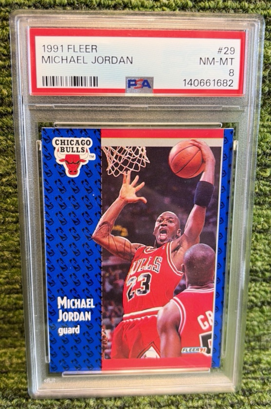 lot 82 image: 1991 Fleer Basketball Card Michael Jordan #29 PSA 8