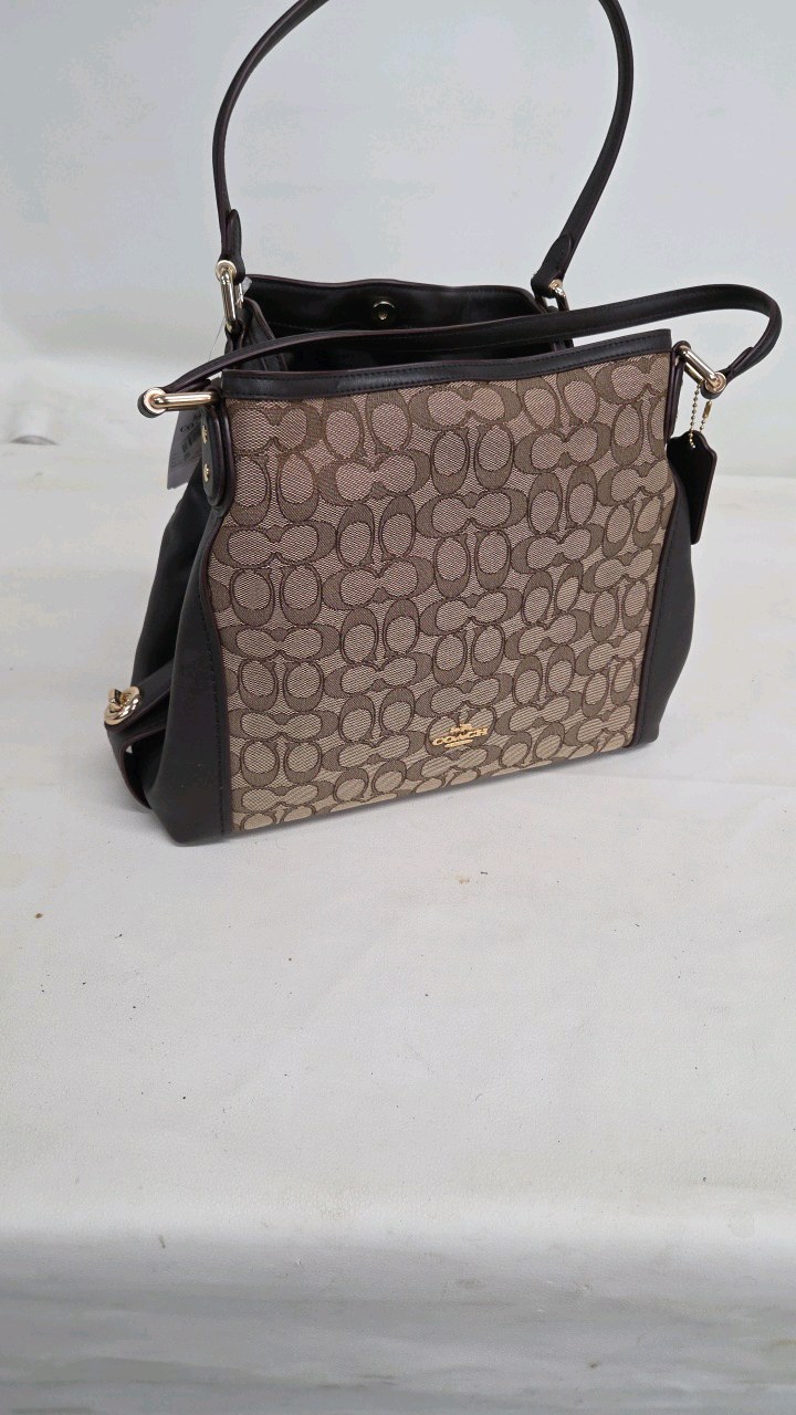 lot 44 image: Coach Handbag