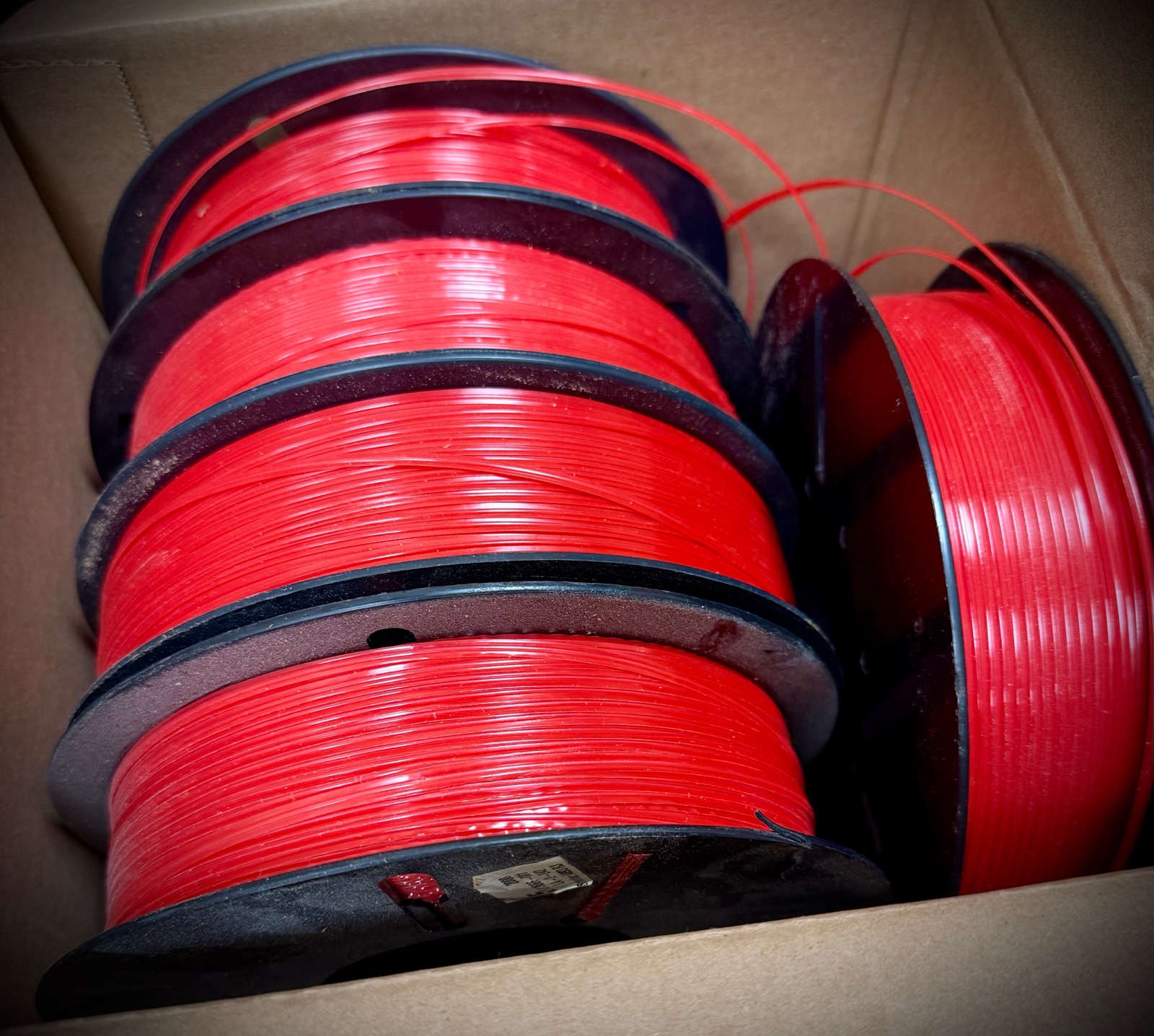 lot 285 image: red twist tie rolls