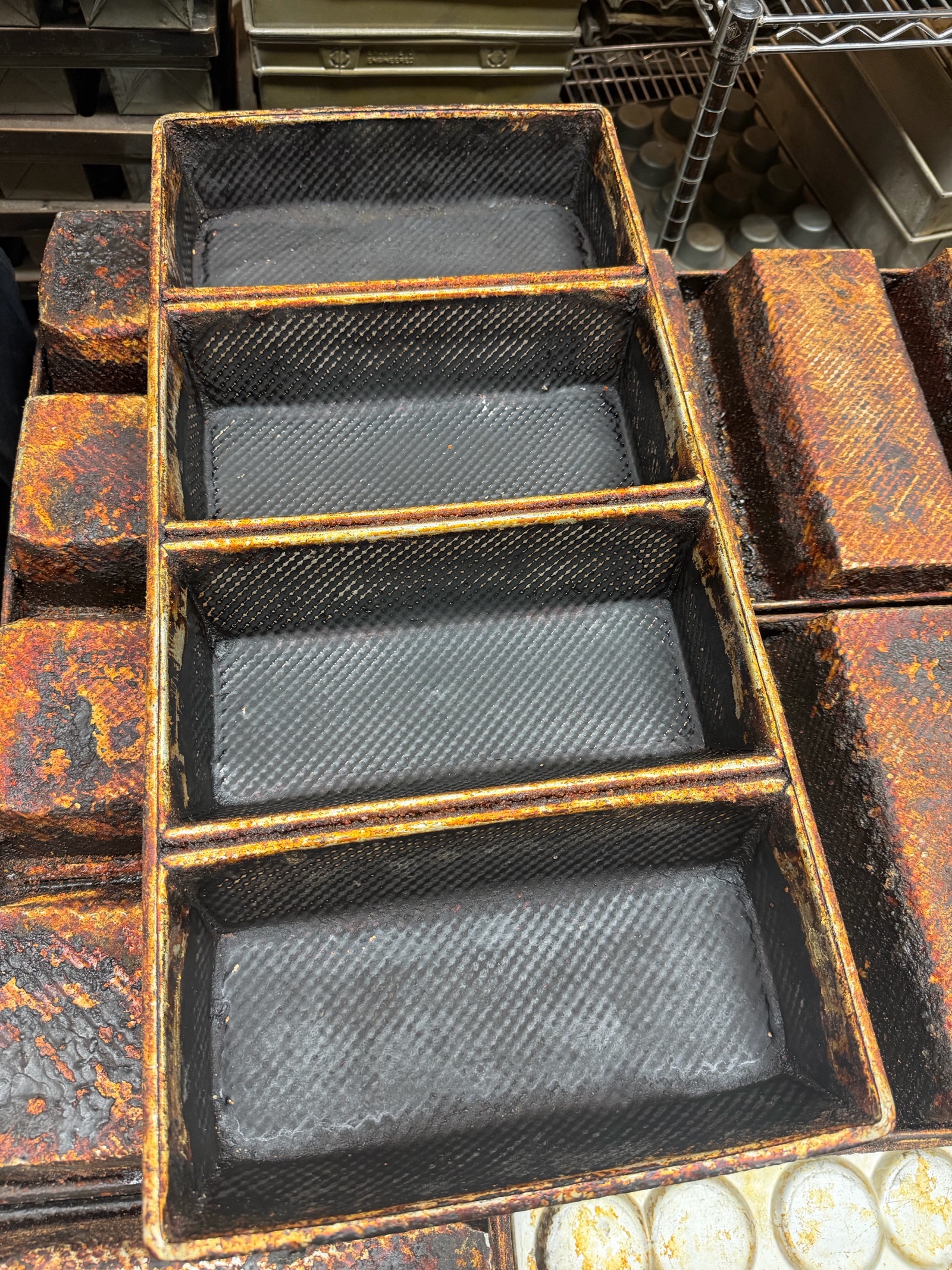 lot 396 image: four strap hearth bread pan