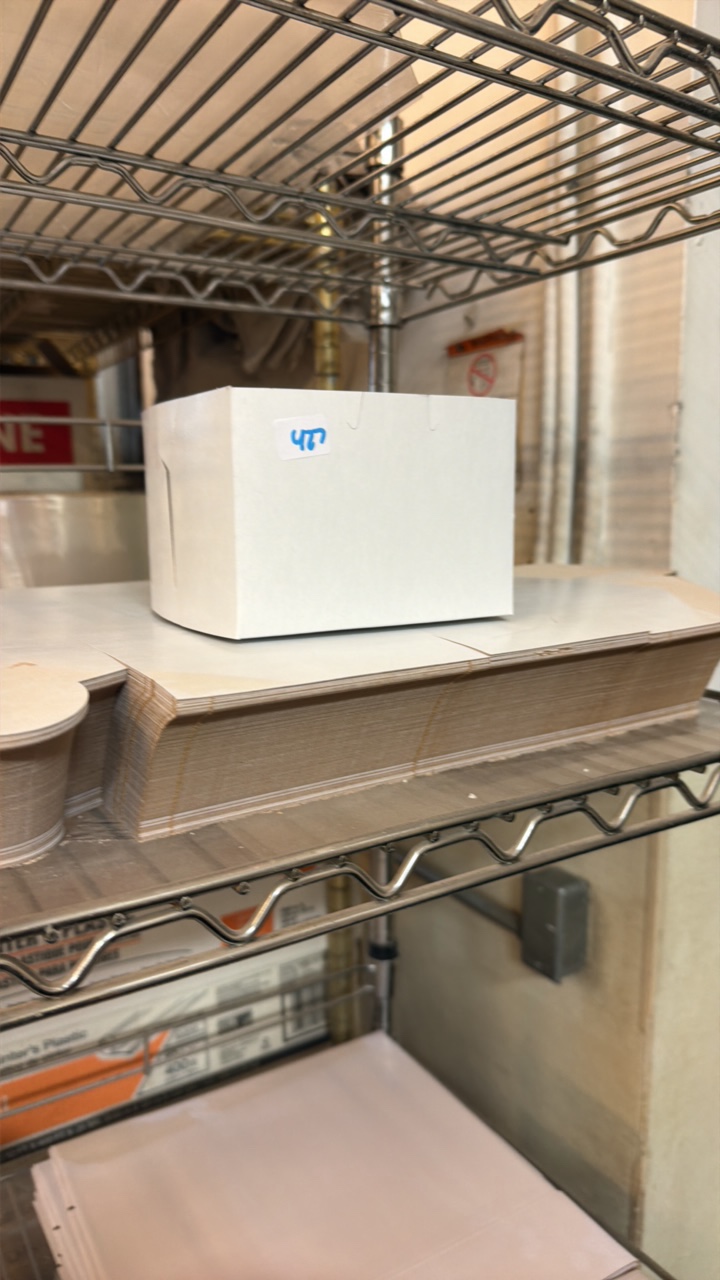 lot 427 image: stack of white boxes