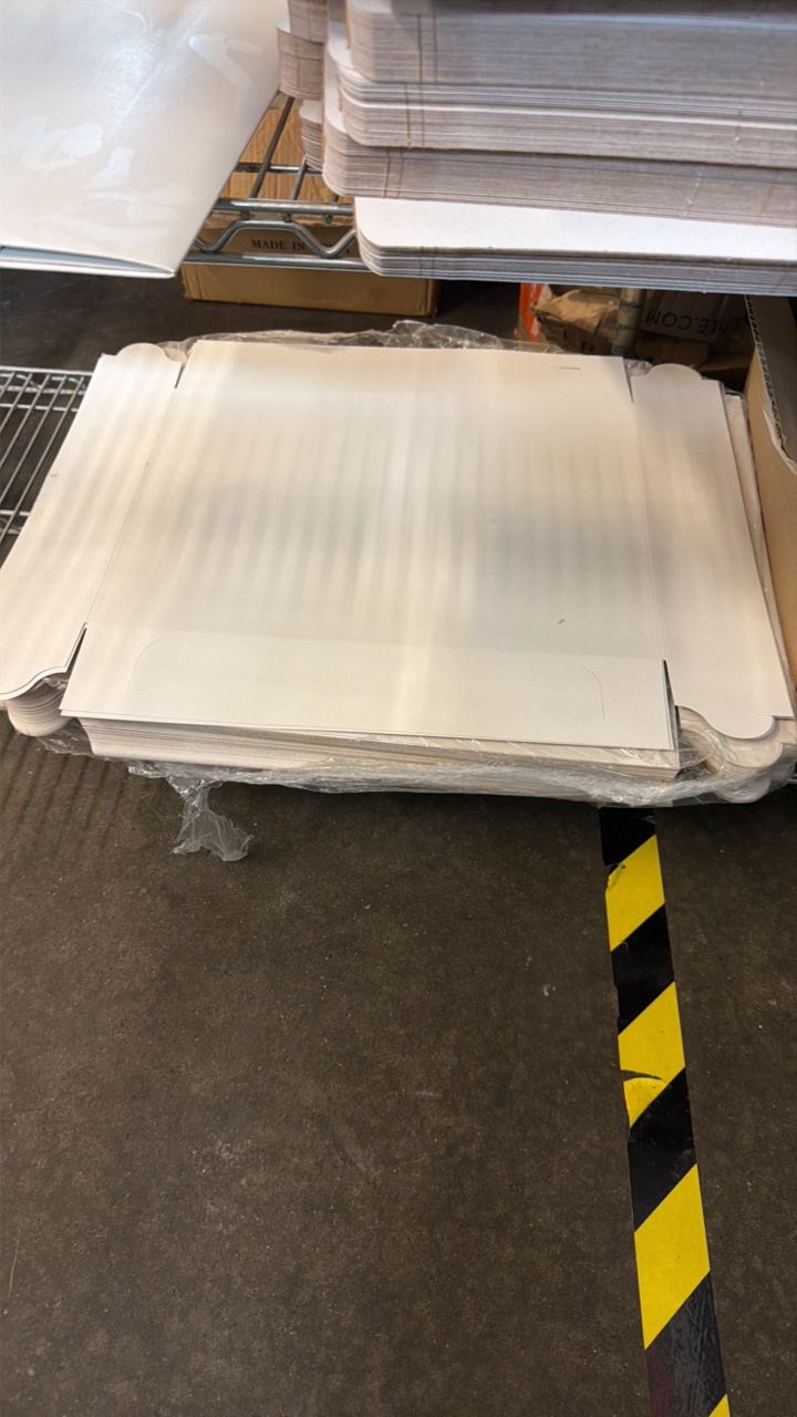 lot 431 image: Stack of white boxes