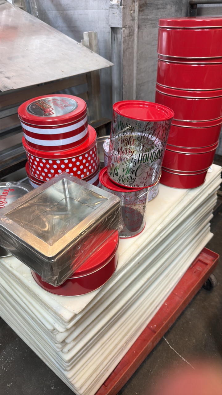 lot 512 image: assorted Christmas tins and pails