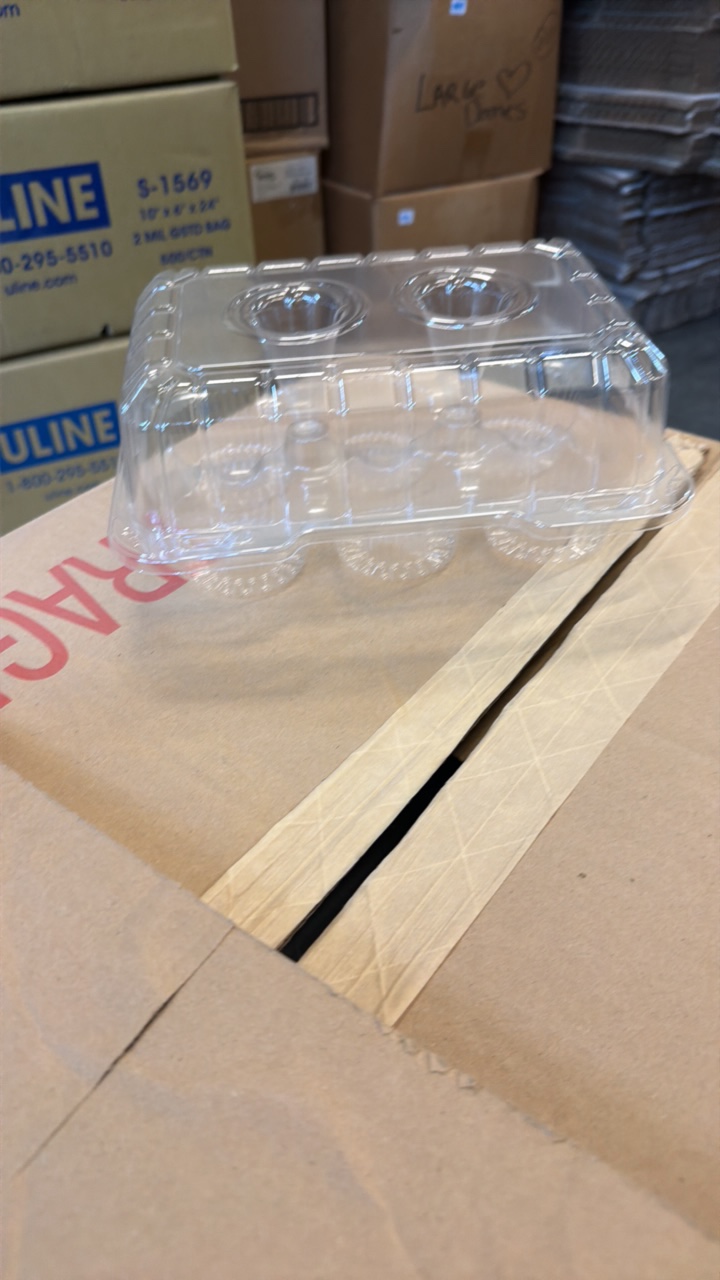 lot 546 image: Half a box of six count cupcake containers