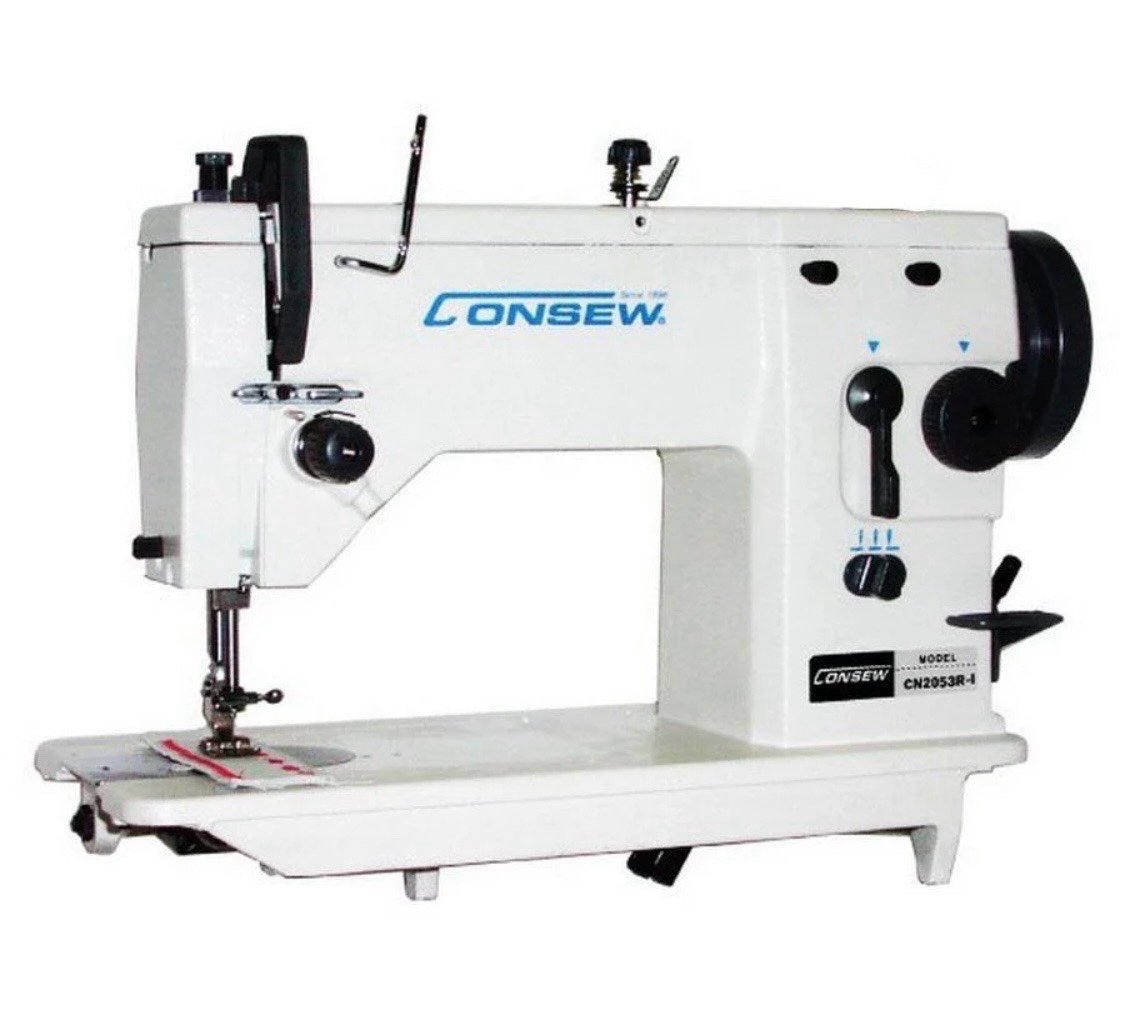 BRAND NEW sewing machine and brand-new table model number CN2053R  1A