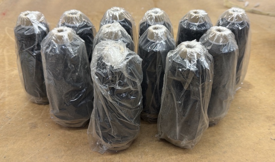 black spools of thread all new