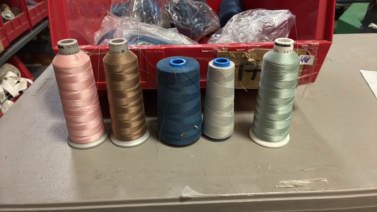 Bucket of miscellaneous serger threads