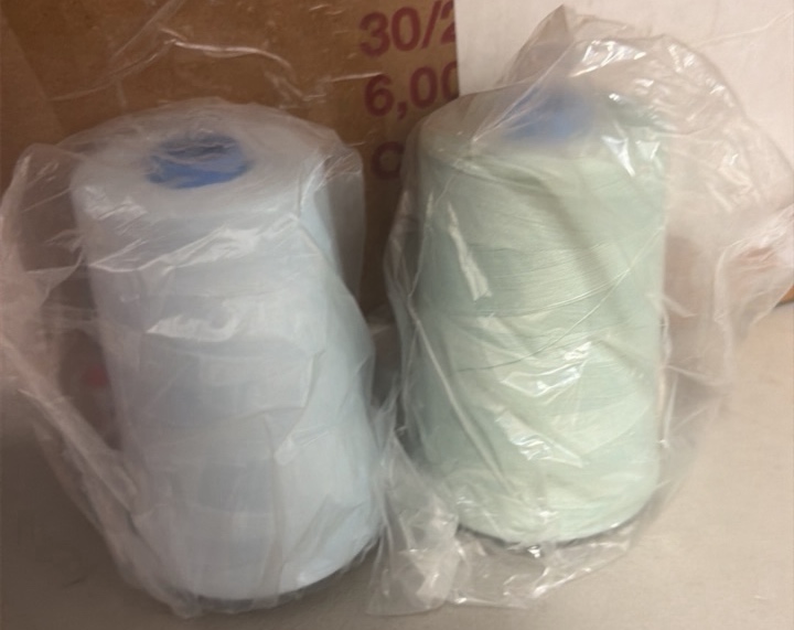 box of embroidery thread cones, all brand new