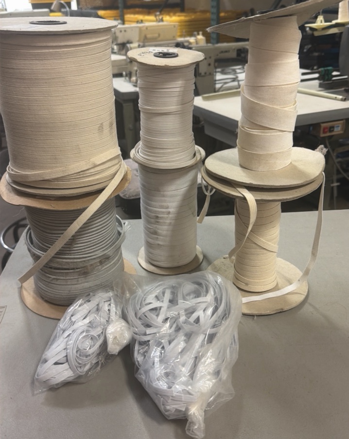 spools of elastic various colors and sizes