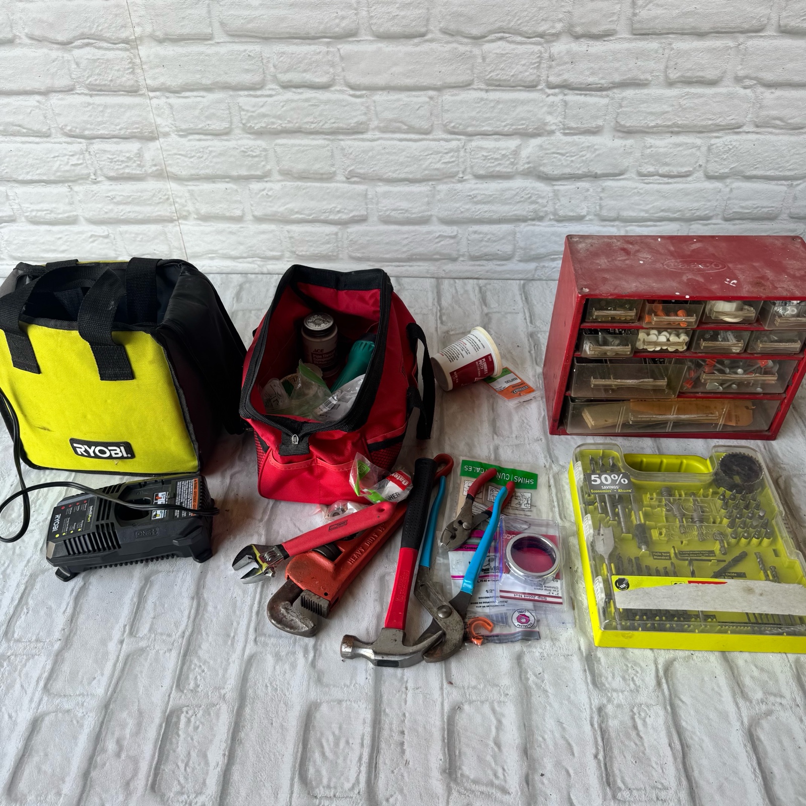 Misc. tools, bits, and Ryobi battery charge