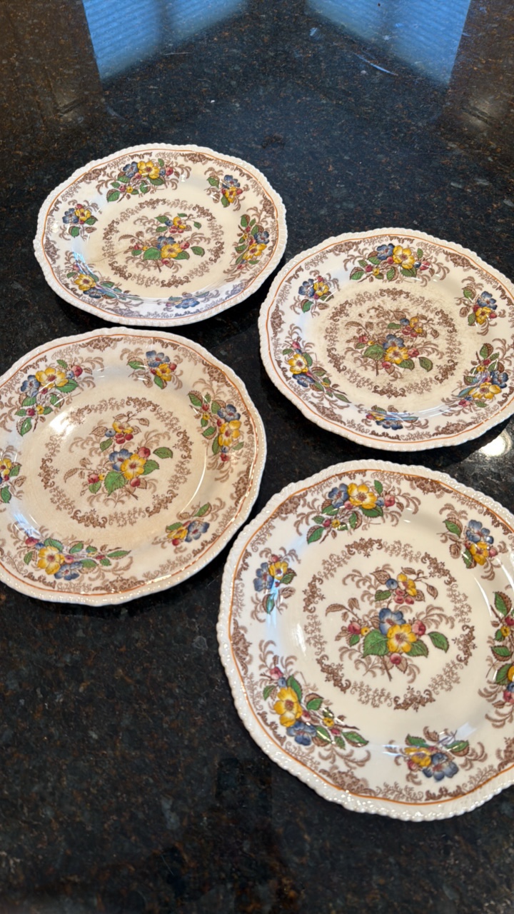 set a four Apple Blossom labeled decorative plates made in Ridgeways England