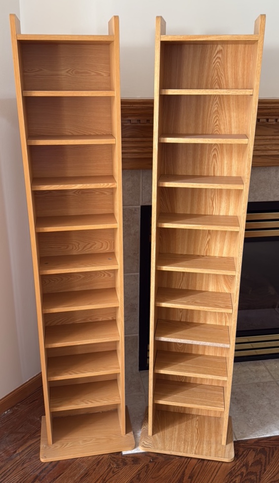 two media storage cabinets with adjustable shelves