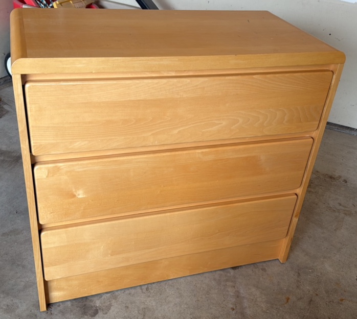 Solid three drawer dresser, light oak color