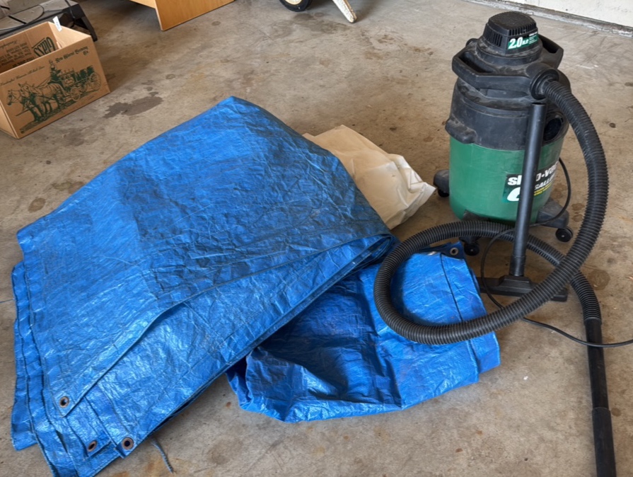 shop vac 2.0 hp shop vacuum with some blue tarps to go with it