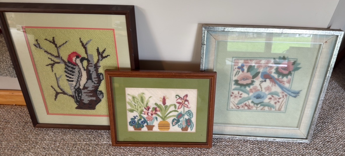 three framed needlepoint pictures