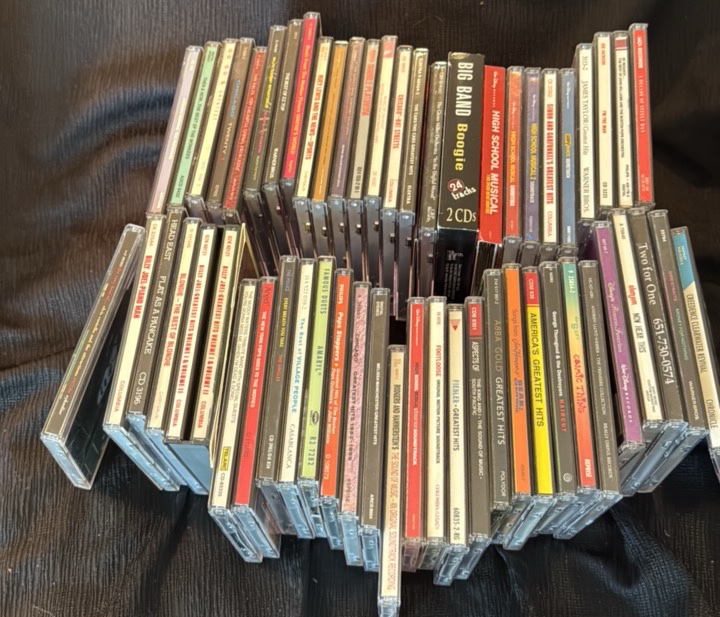 Collection of music CDs from big band to rock n roll