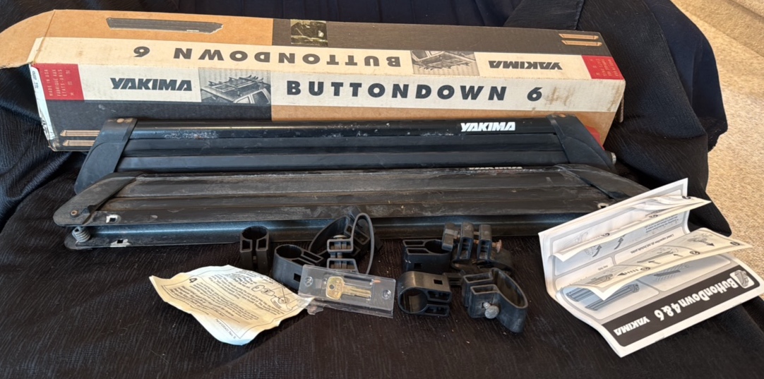 Yakima button down six ski holder for the top of a car
