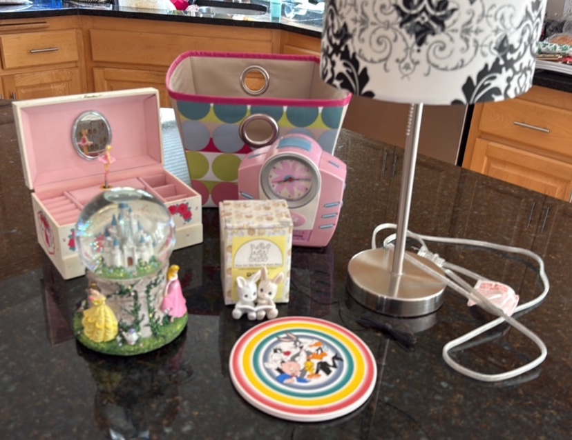 A little girls lot with a Barbie clock radio, a Disney music box, lamp, jewelry box