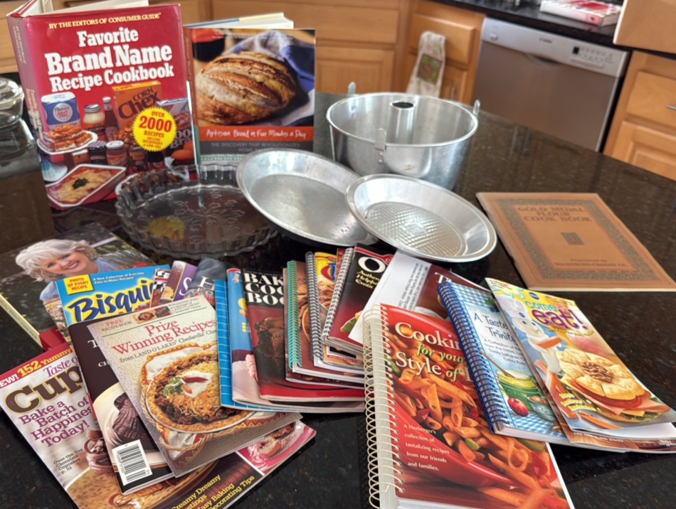 cookbooks galore, and some baking tins to go with it
