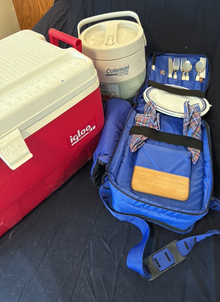 Great picnic collection with a picnic pack, an igloo cooler and a Coleman cooler