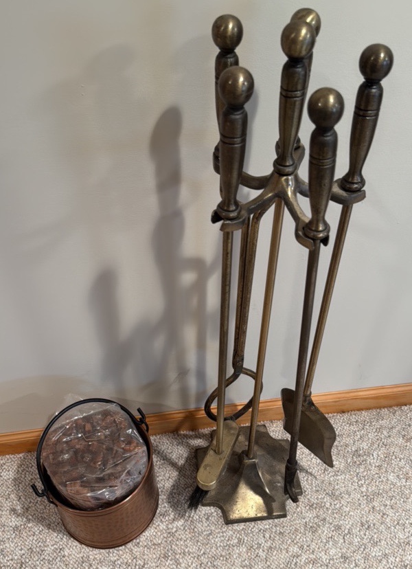 fireplace tool set with copper  bucket, and kindling