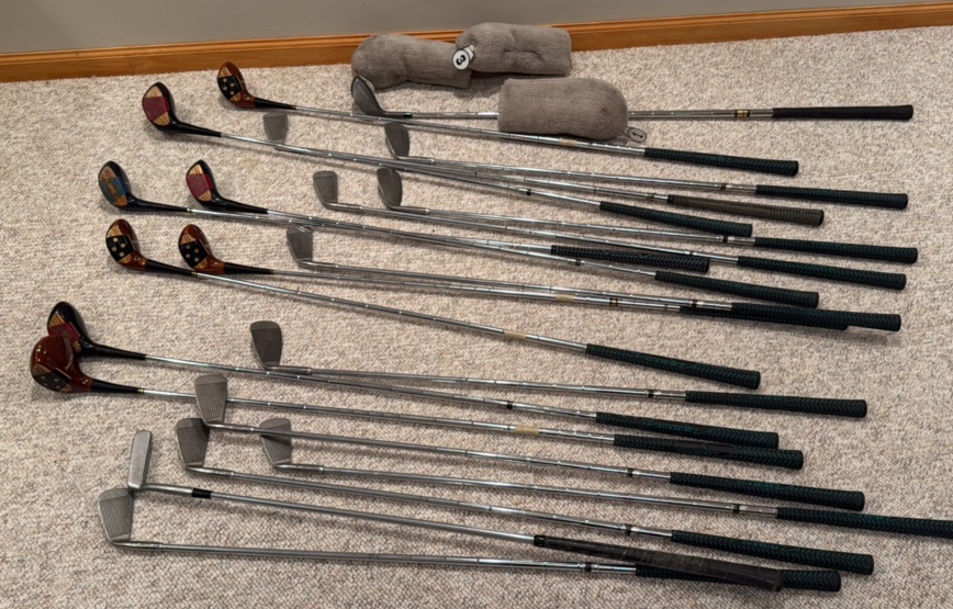 set of Tommie armor swing right and golf pride victory golf clubs