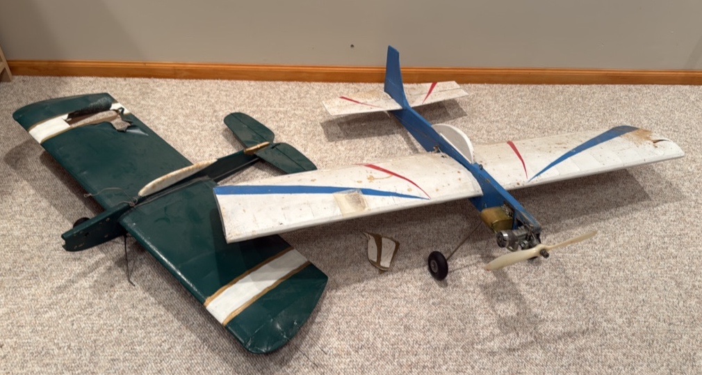 vintage handcrafted airplanes with toolbox used for repairs