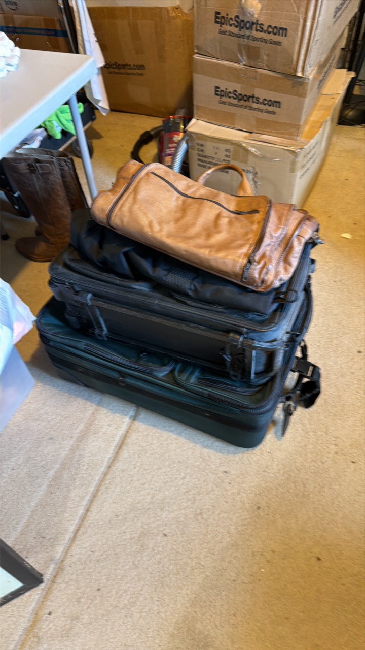 three travel suitcases