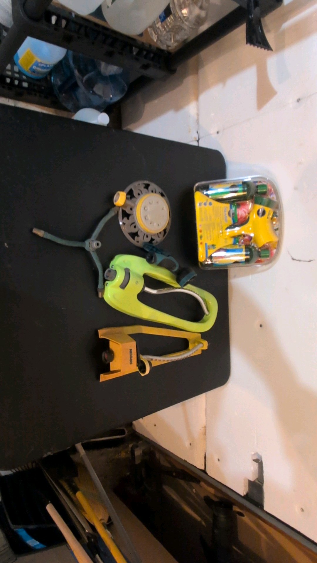 set of sprinklers and hose and more