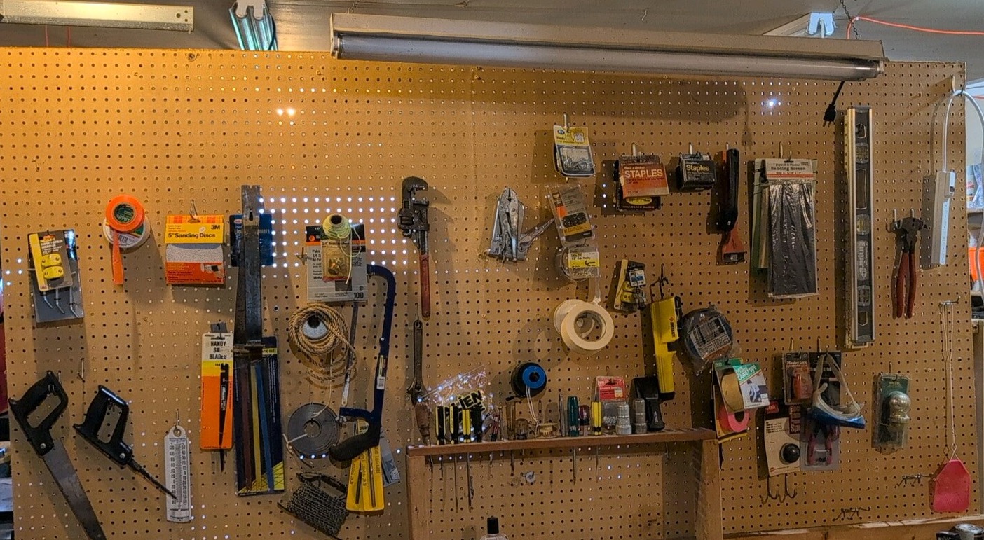 contents hanging from tool bench workbench