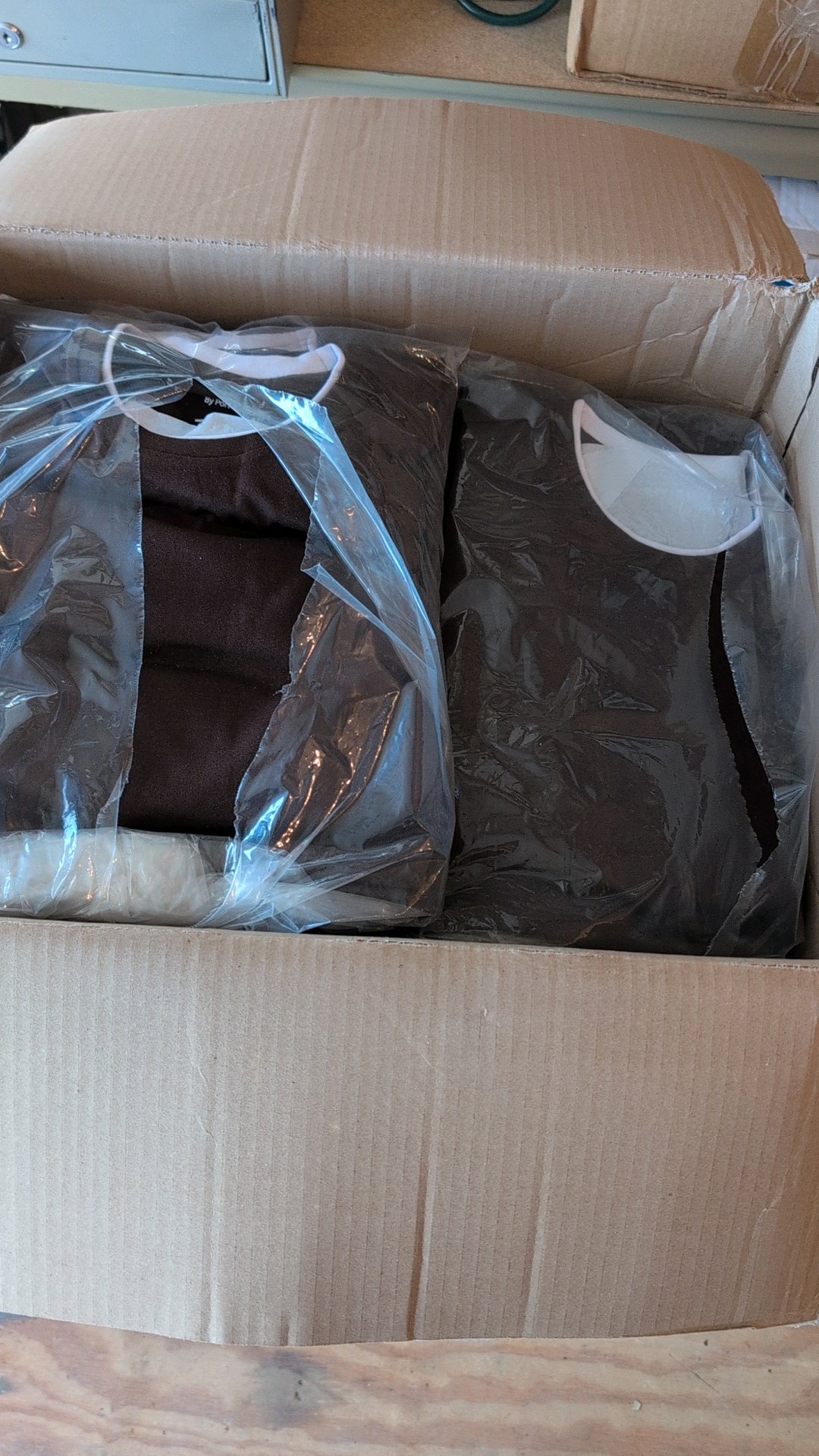 box of Port authority clothing