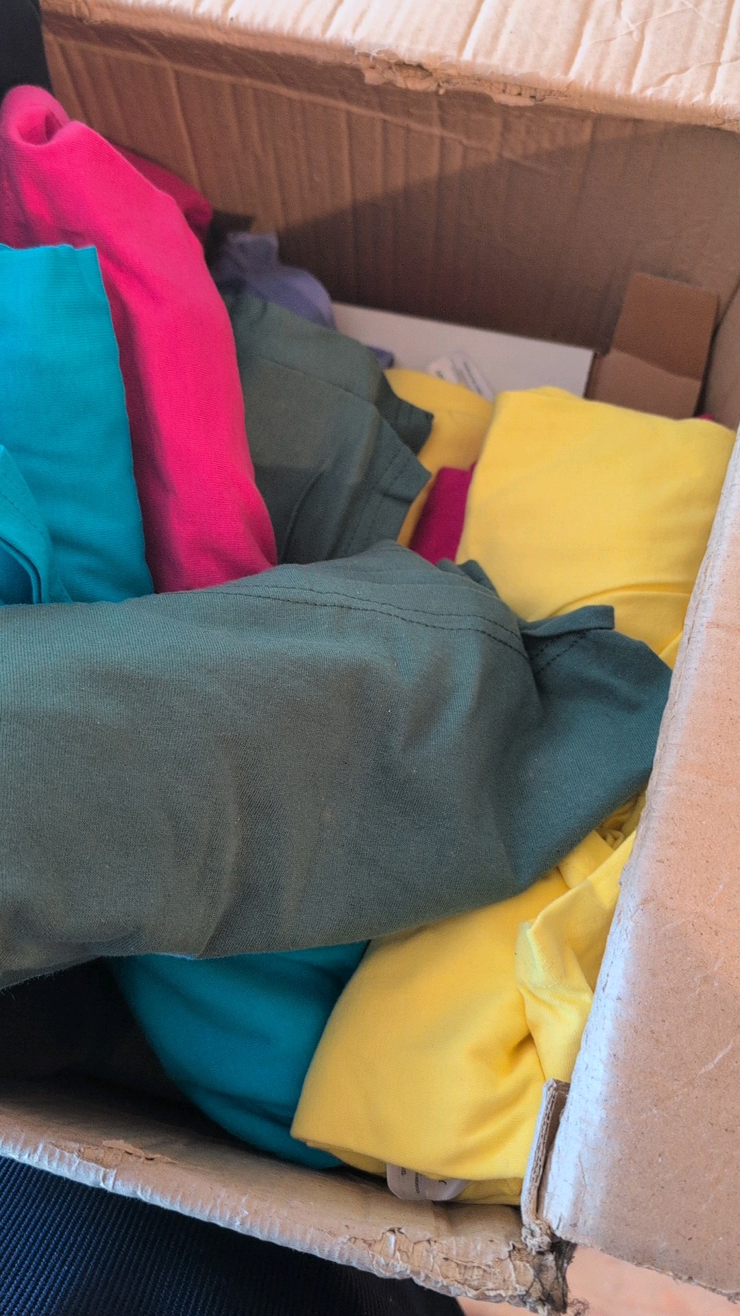 Large box of cotton tees of varieties and colors