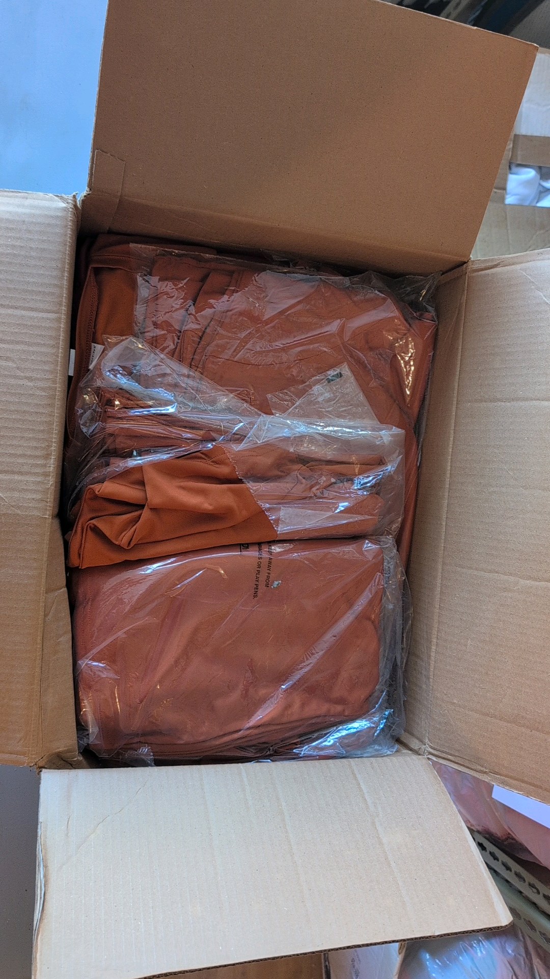 box of sport tech t-shirts