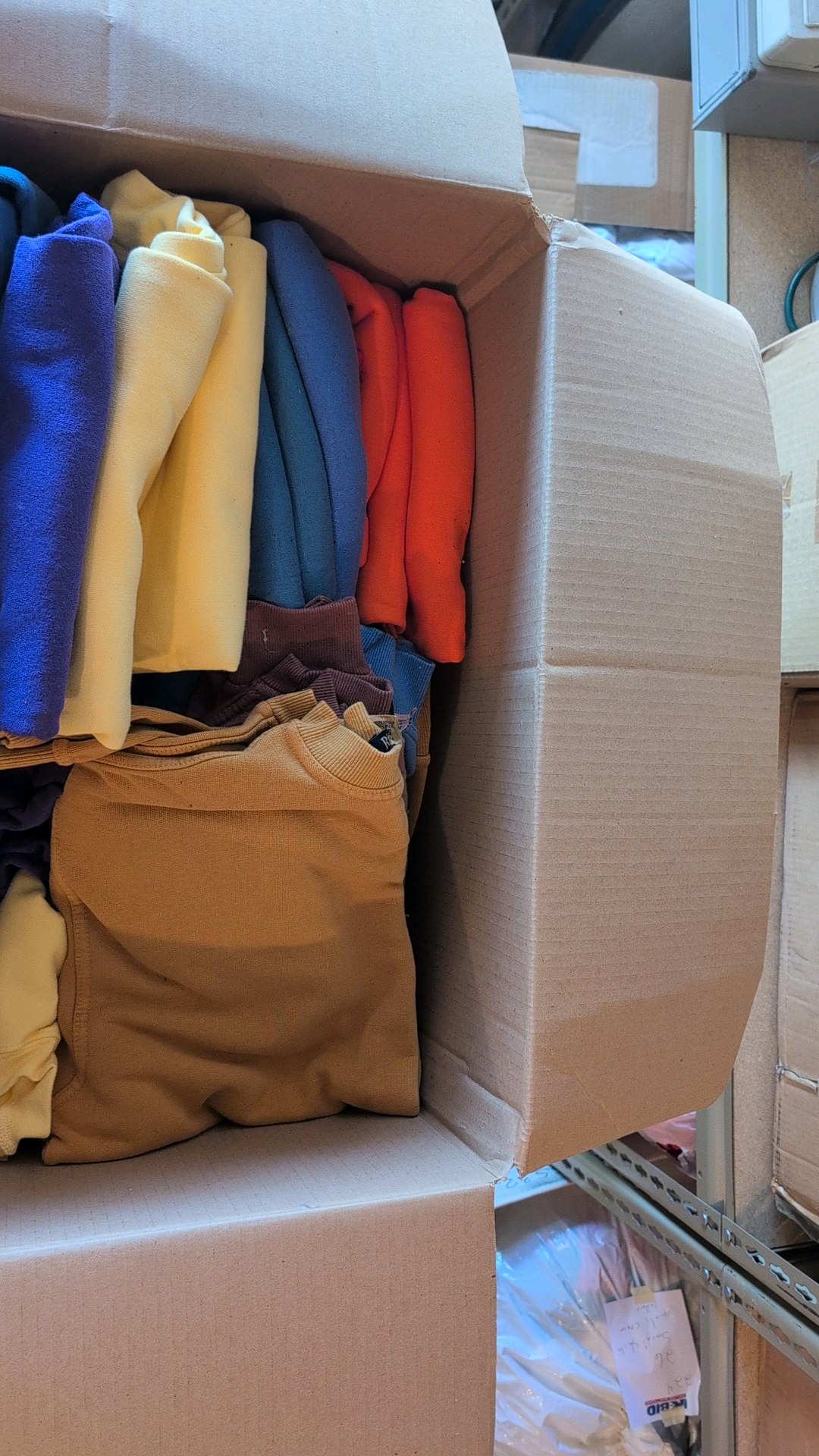 box of sweatshirts