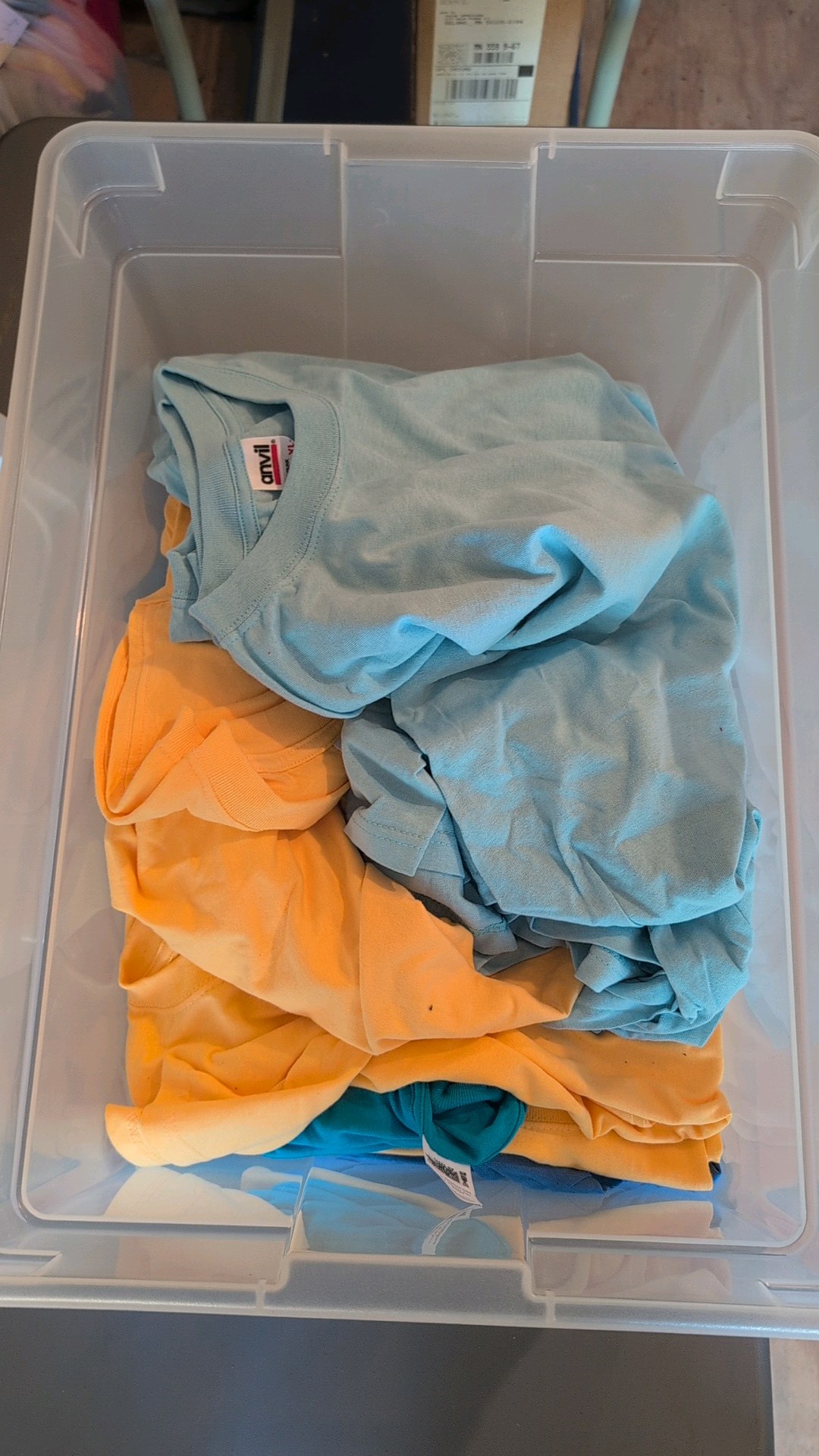 bin of T-Shirts