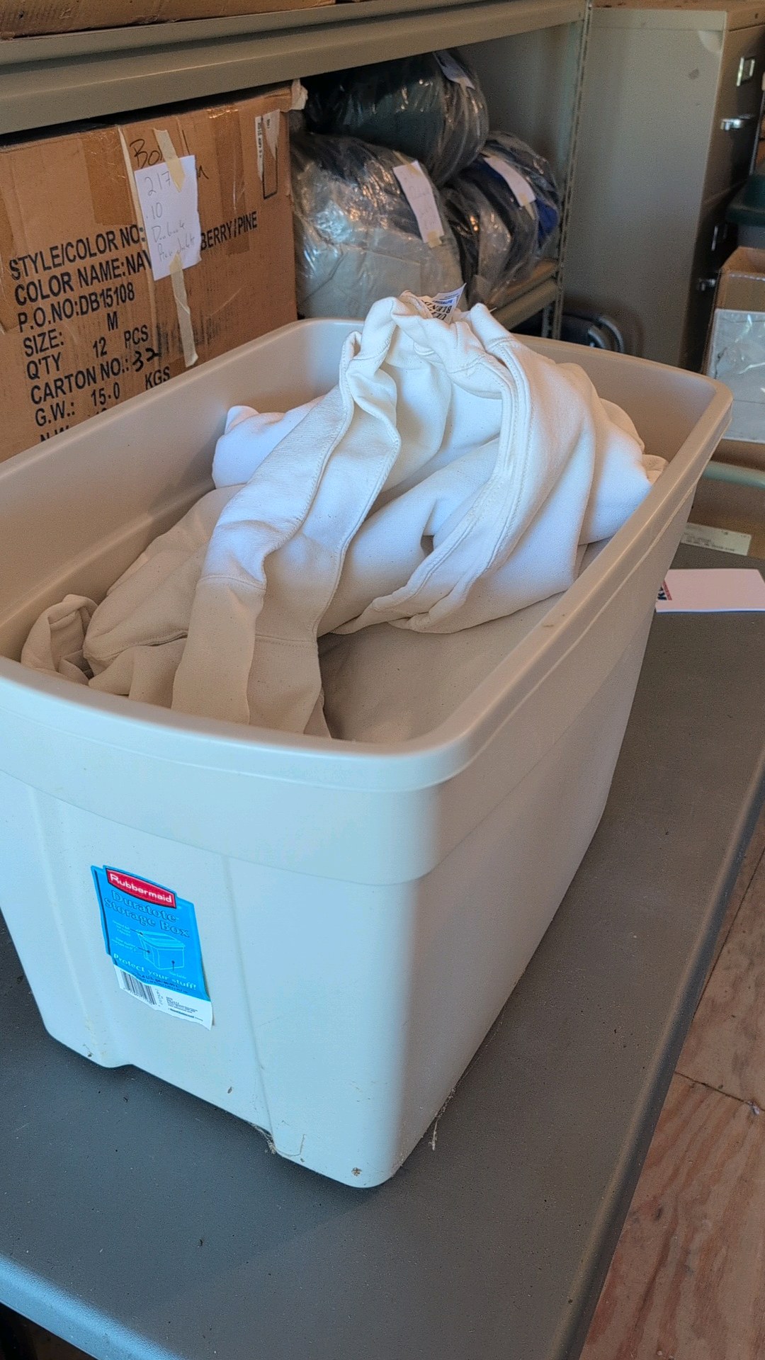 box of sweatshirts