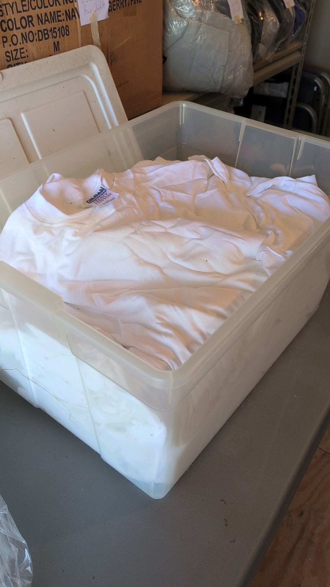 box of Gildan t-shirts