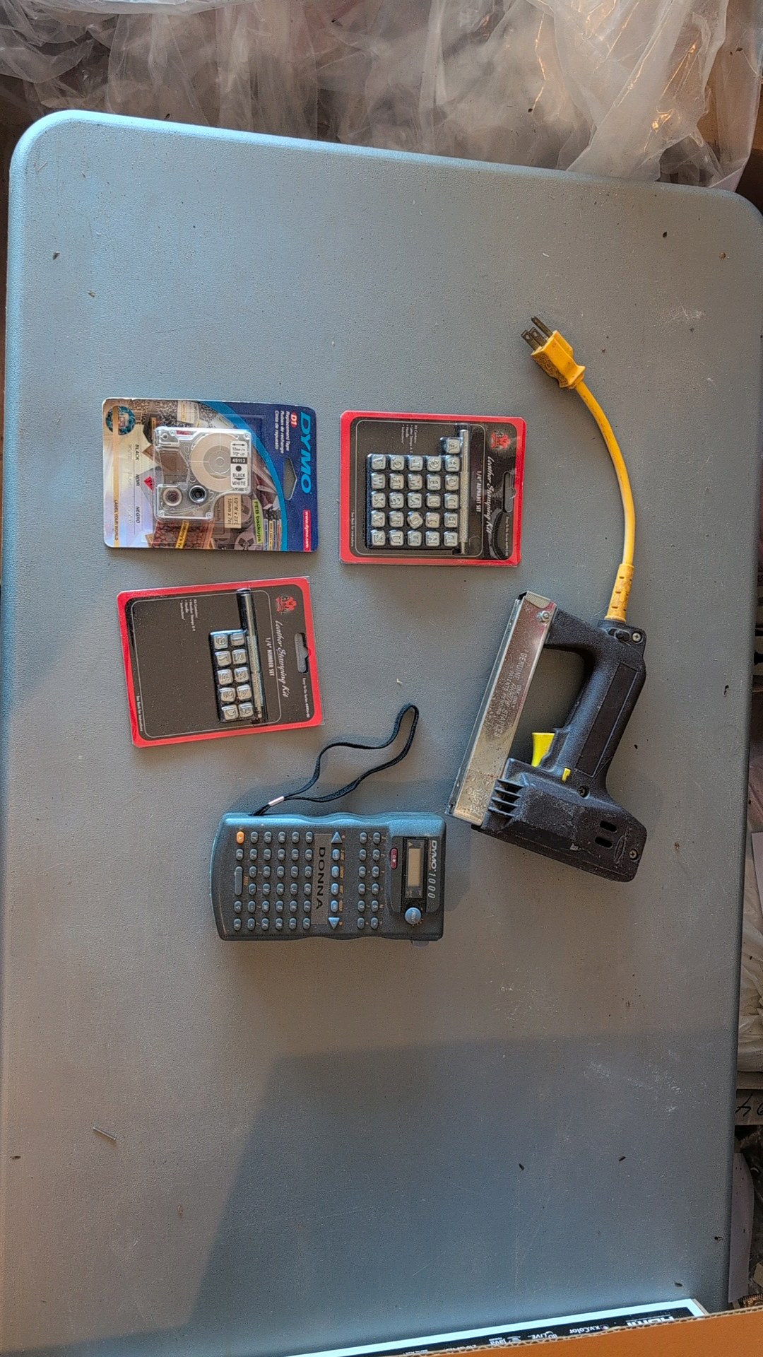 leather alphabet and number stamping kit with electric stapler and electric label maker ass pictured