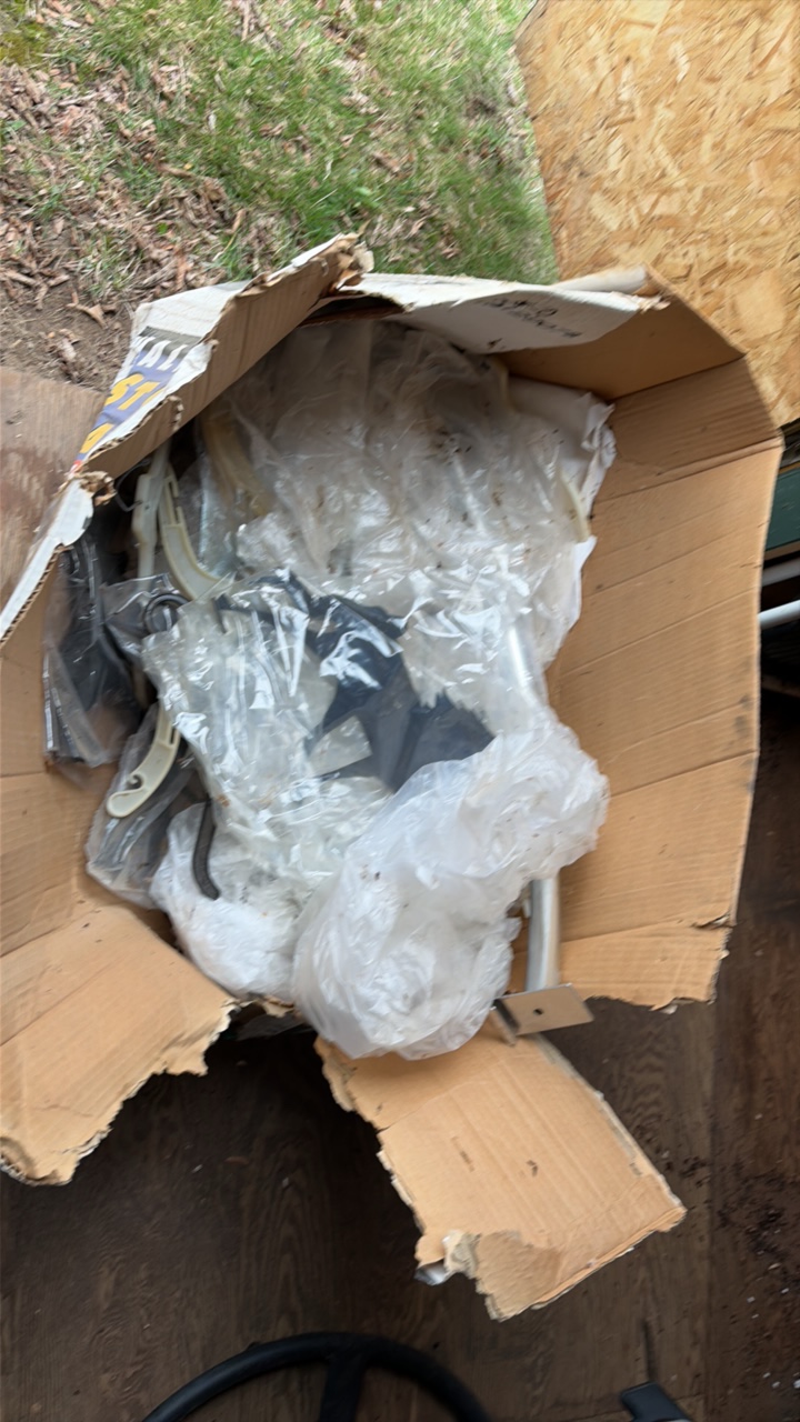 box of hangers and horse decorations