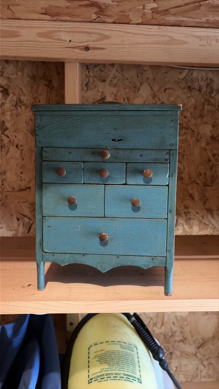 miniature dresser, contents Unknown