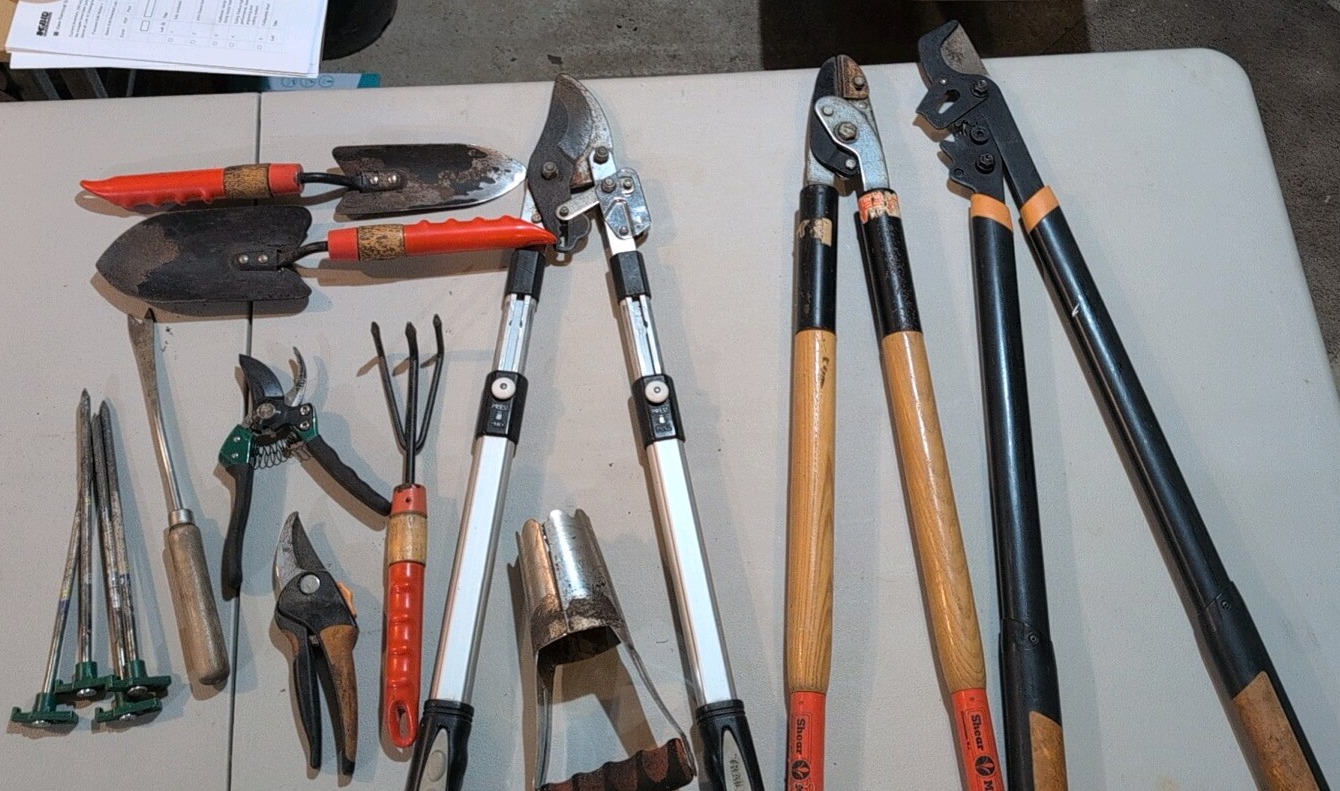 assortment of garden tools and snips