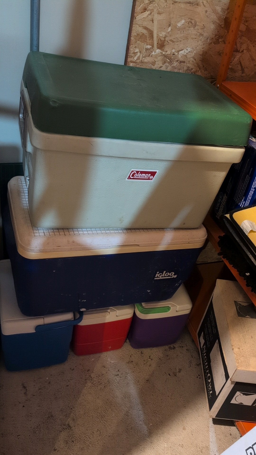 five coolers of different sizes