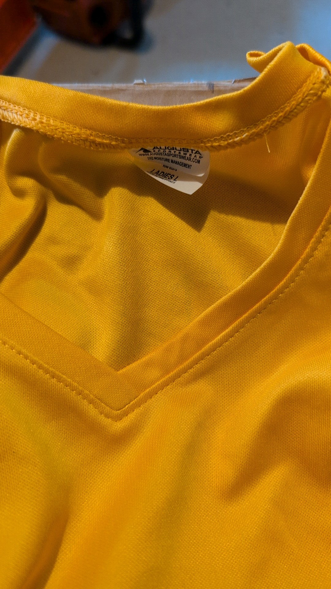box of v-neck Dri-Fit shirts