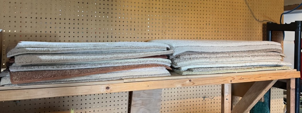 lot of carpet tiles in various colors