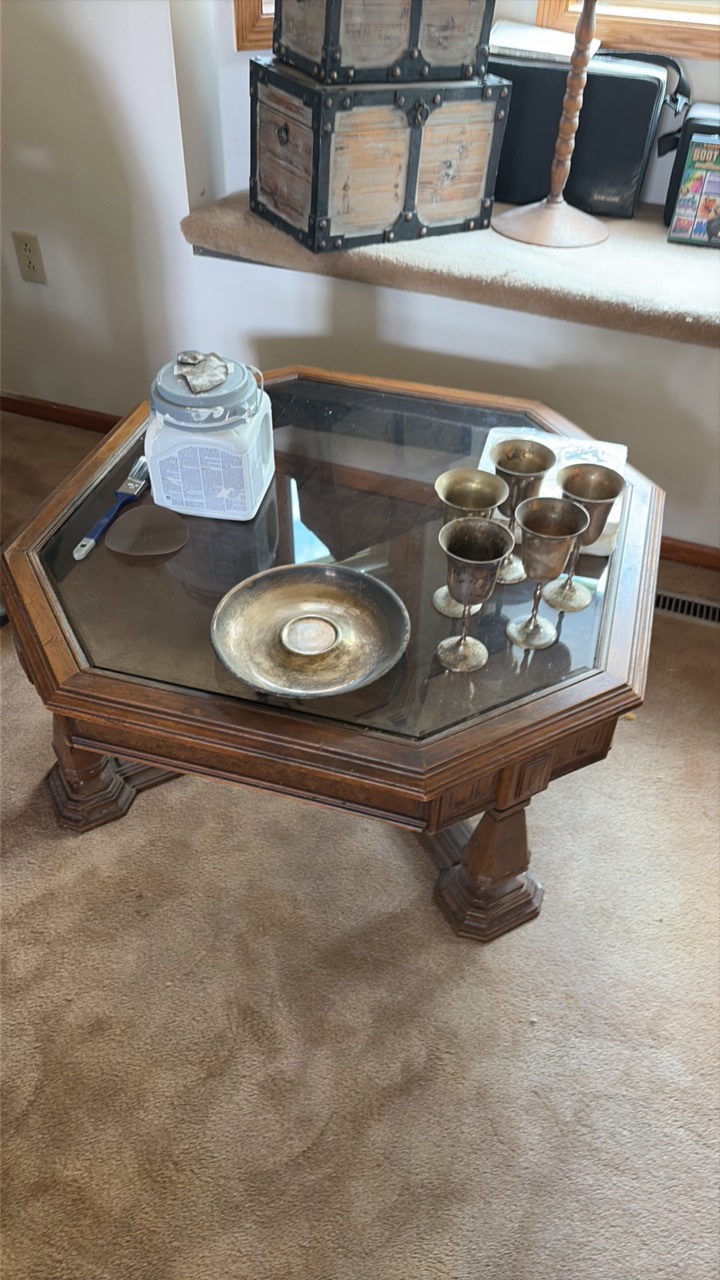 wooden table with glass top dimensions are 39 inches by 39 inches by 16 inches.